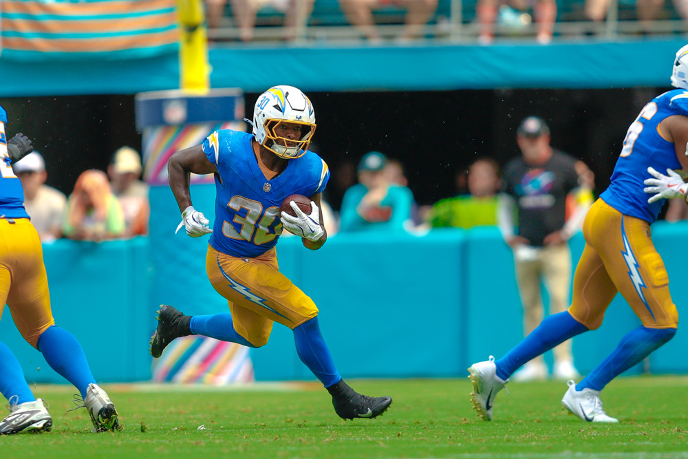 MIAMI GARDENS, FL - OCTOBER 12: Running Back Kimani Vidal #30 of the Los Angeles Chargers runs with the ball in the second half during the game between the Los Angeles Chargers and the Miami Dolphins, on Sunday October 12, 2025, at Hard Rock Stadium in Miami Gardens, FL.(Photo by Chris Arjoon/Icon Sportswire)
