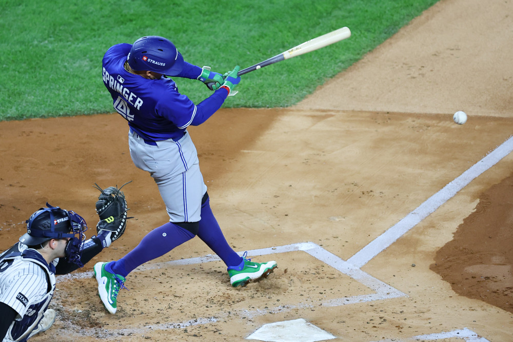 BRONX, NY - OCTOBER 08: George Springer #4 of the Toronto Blue Jays at bat during Game 4 of the ALDS against the New York Yankees on October 8, 2025 at Yankee Stadium in the Bronx, New York. (Photo by Rich Graessle/Icon Sportswire)